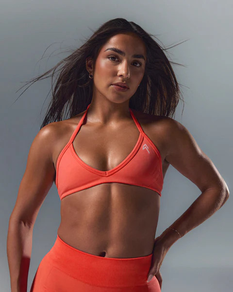 EnhanceLift™ Seamless Minimal Halter Neck Bralette with White Logo 
 Charged Coral | Oner Active (UK / US)