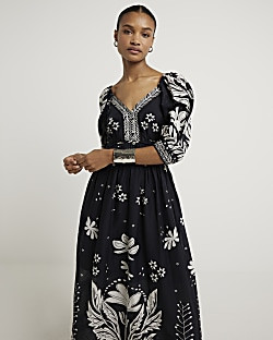 Black floral puff sleeve swing maxi dress | River Island (UK & IE)