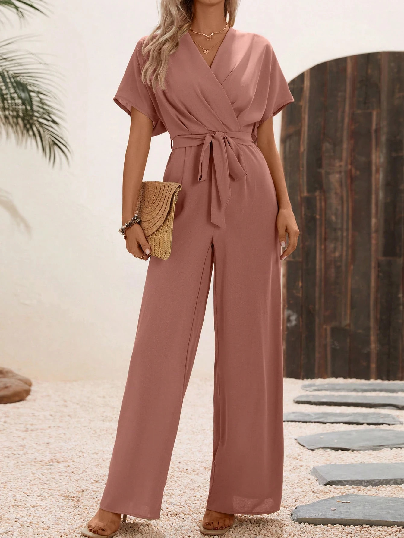 SHEIN LUNE Solid Surplice Neck Belted Jumpsuit | SHEIN