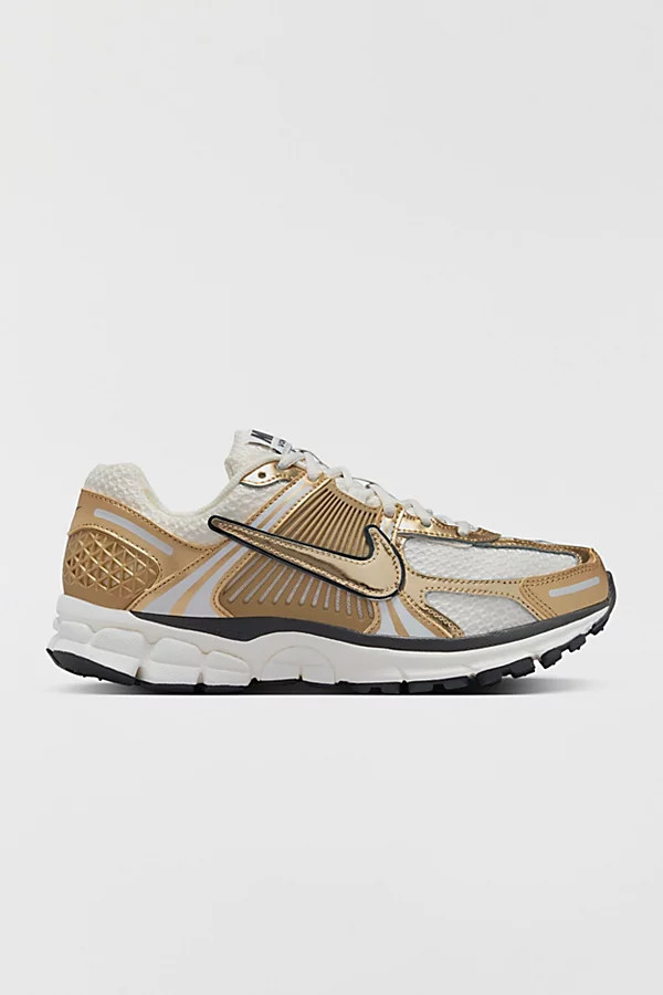 Nike Women's Zoom Vomero 5 Metallic Gold Sneaker in Photon Dust/Metallic Gold/Gridiron, Women's at Urban Outfitters | Urban Outfitters (US and RoW)
