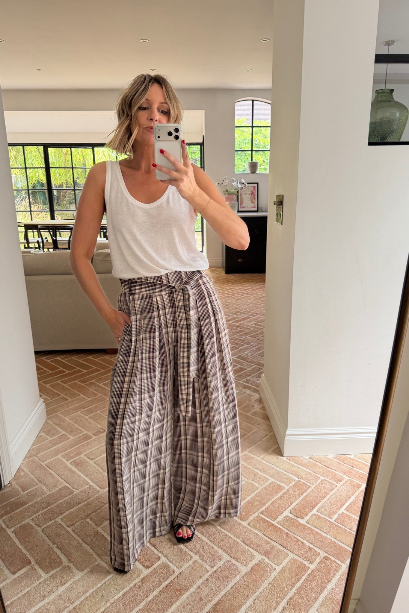 Relaxed trousers + a vest top

#LTKuk #LTKsummer #LTKdatenight