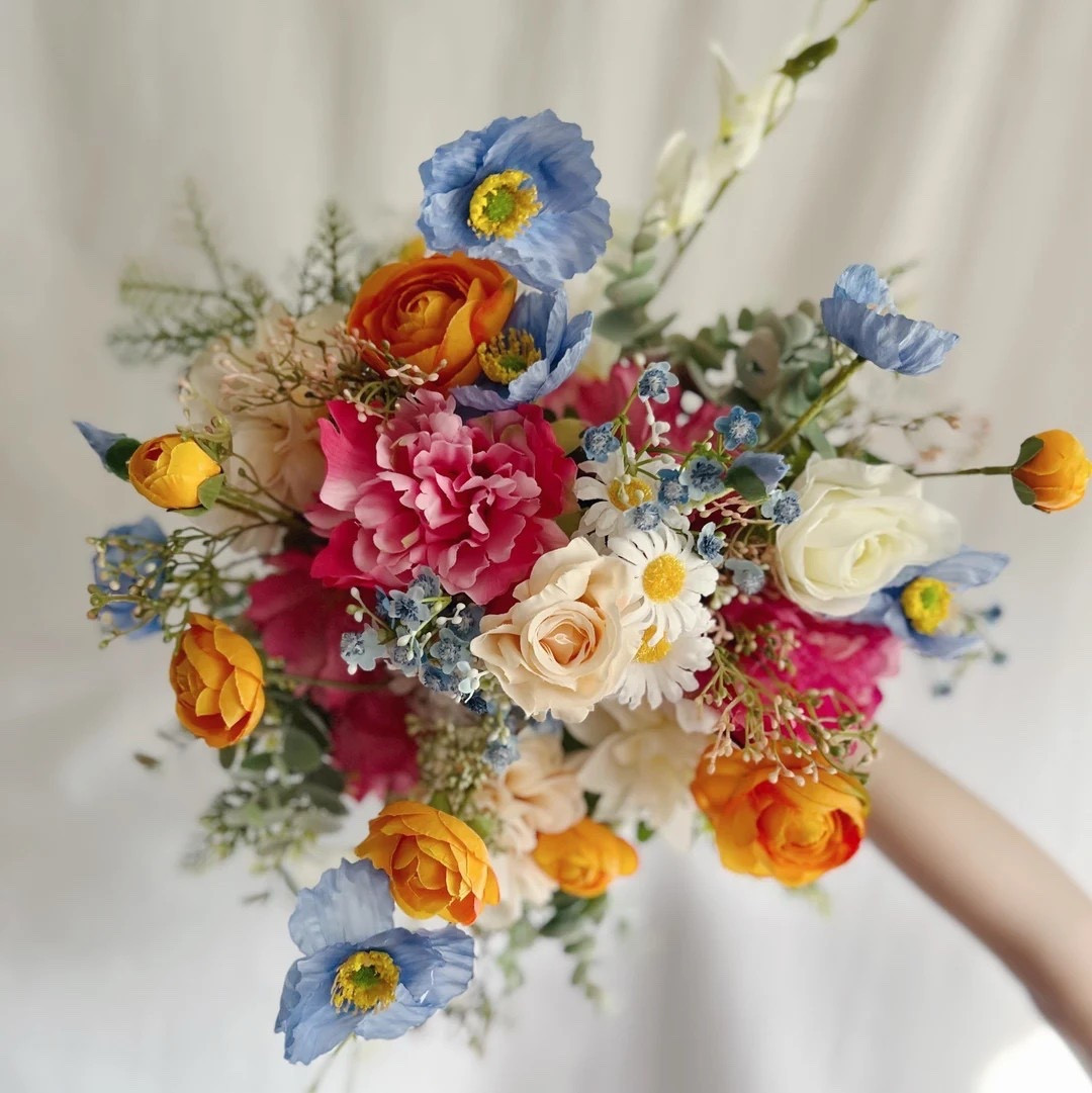 Soft, romantic, and beautifully coordinated, this artificial wedding bouquet by RomancePlace is a timeless choice for your big day. Designed with faux flowers in dreamy shades of blue, pink, cream, and orange, plus delicate berries and fillers, it brings effortless elegance without the worry of wilting. The twine-wrapped stems add a natural, handcrafted touch, while the 12” bridal bouquet pairs perfectly with matching 8” bridesmaids bouquets and a 6” toss bouquet. Ships from New York, making it a more planet-friendly option 🌿, with coordinating corsages and boutonnières available to complete your wedding florals.

#LTKwedding #WeddingBouquet #BridalInspo #FauxFlorals #RomanticWedding #EtsyWedding #BridesmaidsBouquets #WeddingDetails #SustainableShopping

#LTKWedding #LTKHome #LTKSeasonal