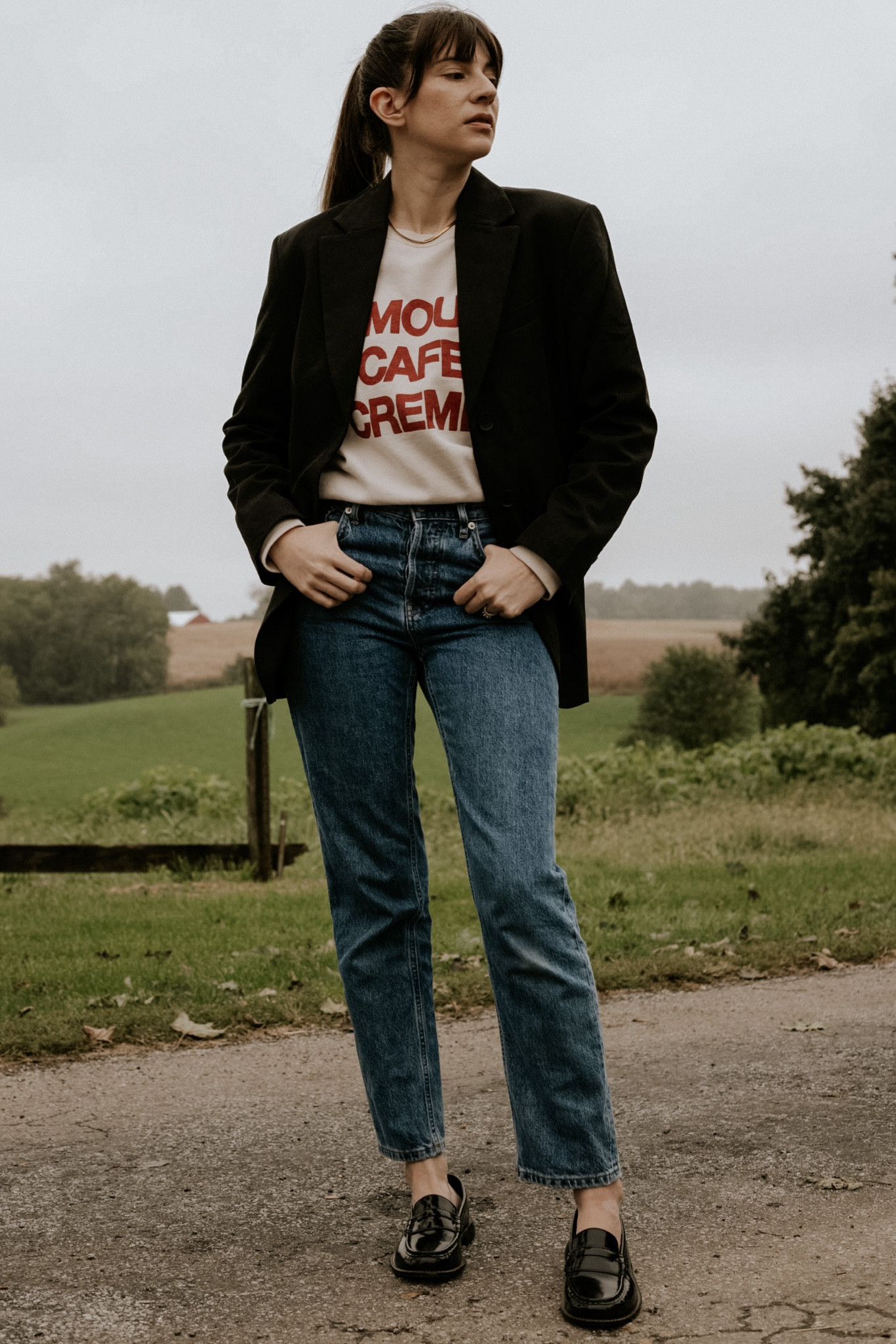 Oversized black blazer with sezane sweatshirt, mom jeans, and loafers. #springstyle 