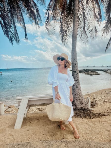 The perfect white linen vacation dress 

#LTKtravel #LTKSeasonal #LTKfindsunder100