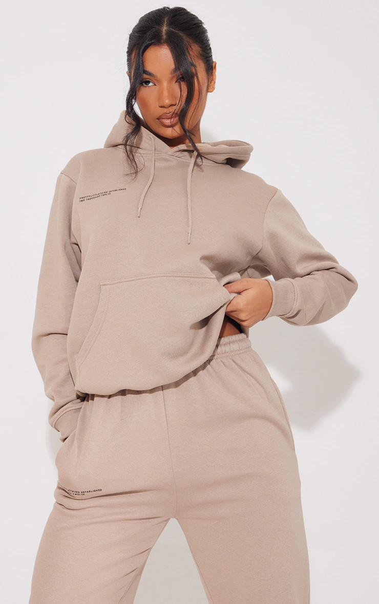 PRETTYLITTLETHING Mocha Established 2012 Oversized Hoodie | PrettyLittleThing US