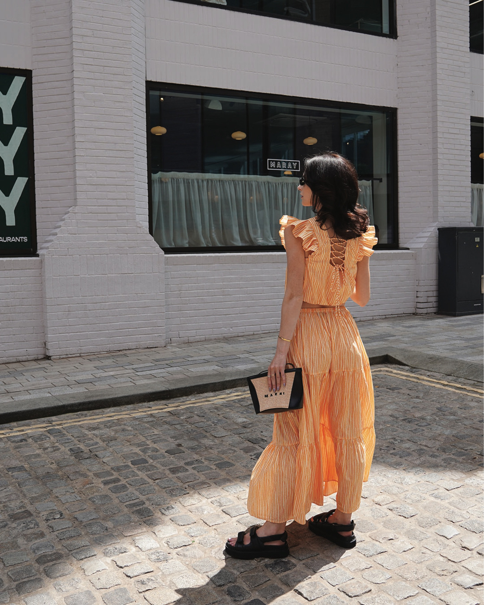 orange matching separates by whistles 
sunglasses by le specs
bag by marni via net a porter 
sandals by isabel marant via matches fashion 
silver earrings by astrid & miyu 

#LTKstyletip #LTKSeasonal #LTKeurope