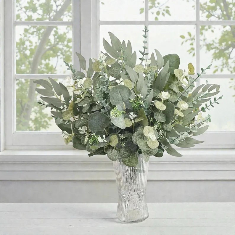 Refresh your space with this 20-piece mixed artificial eucalyptus stem set from PlantsartBoutique. Designed with realistic silver dollar leaves and lush eucalyptus varieties, these flexible faux stems are perfect for vase styling, farmhouse décor, wedding florals, or DIY arrangements. Enjoy all the beauty of fresh greenery with none of the upkeep. #LTKHome #HomeDecor #FauxPlants #EucalyptusDecor #FarmhouseStyle #WeddingDecor #EtsyFinds #InteriorStyling #GreeneryDecor #DIYDecor

#LTKSeasonal #LTKHome #LTKWedding
