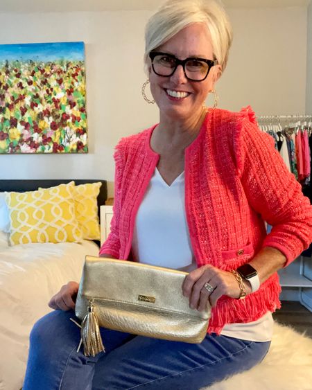 Tweed jackets are a classic and a must-have layering piece for fall this season. This one features gold buttons and fringe detail. I’ve paired it with a loose white tank, blue jeans, and all gold accessories including this soft fold-over clutch.


#LTKworkwear #LTKstyletip #LTKSeasonal