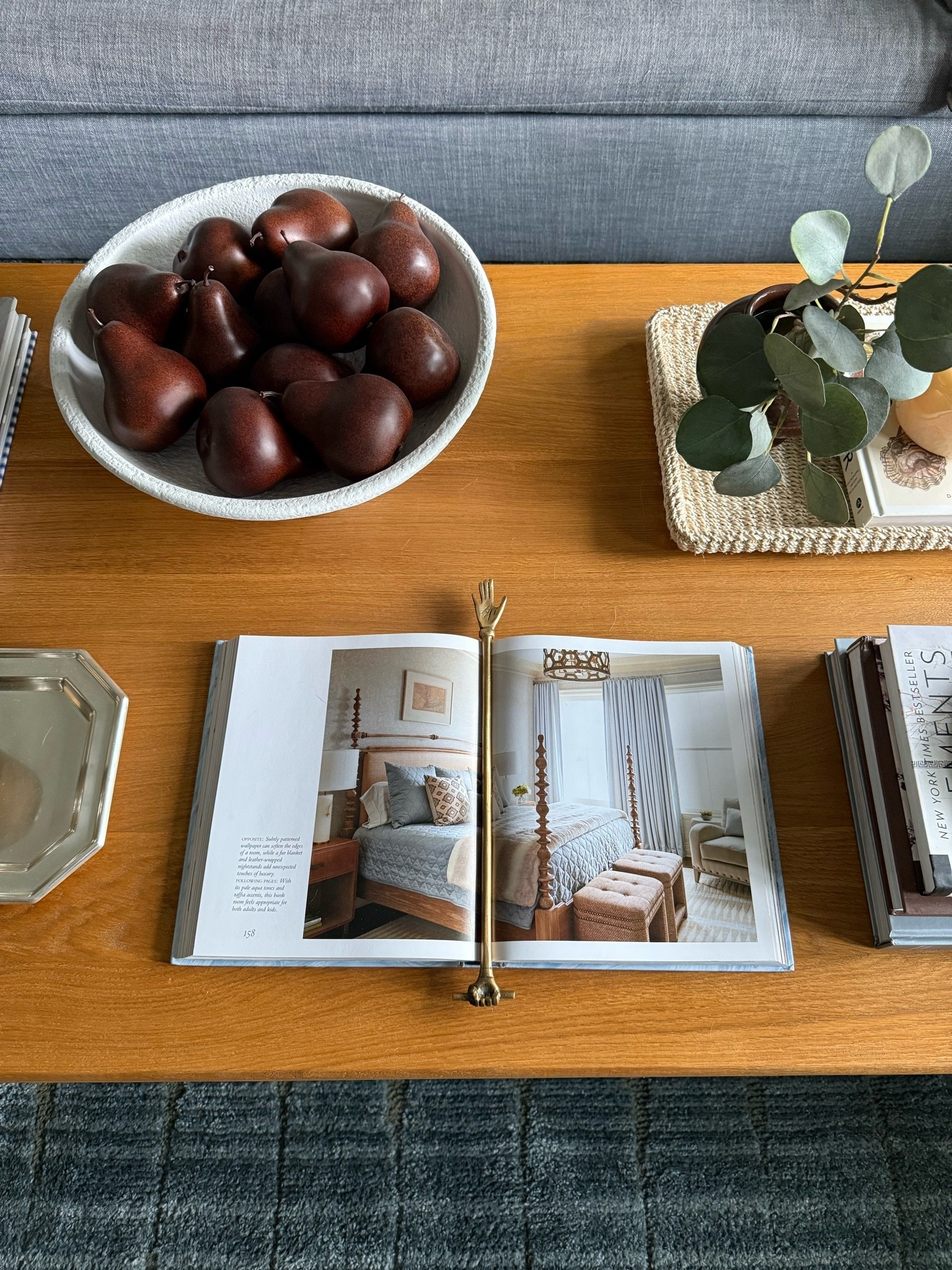 Some of my favorite corners in our home are the ones that feel layered and lived in with simple everyday details. I love styling coffee table books with organic elements like decorative pears and little collected pieces throughout the house because it instantly makes a space feel warm, cozy, and thoughtfully curated without feeling overly styled.

coffee table styling, decorative pears, brass bookmark, neutral home decor, cozy living room ideas, coffee table books, layered home styling, collected home aesthetic, coastal traditional decor, amazon home finds, Girl on the Hudson

#LTKHome #LTKSeasonal