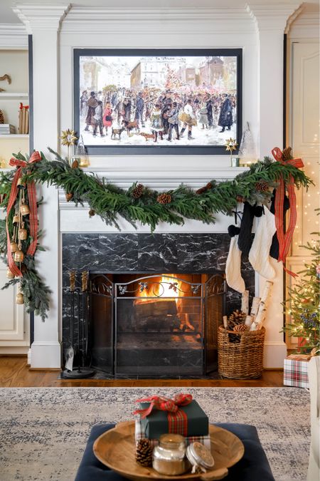 My red plaid living room has my favorite garland, bells and ribbon. With a winter scene on my picture frame TV and a warm fire glowing I’m ready for cooler weather.

#LTKSeasonal #LTKHoliday #LTKhome