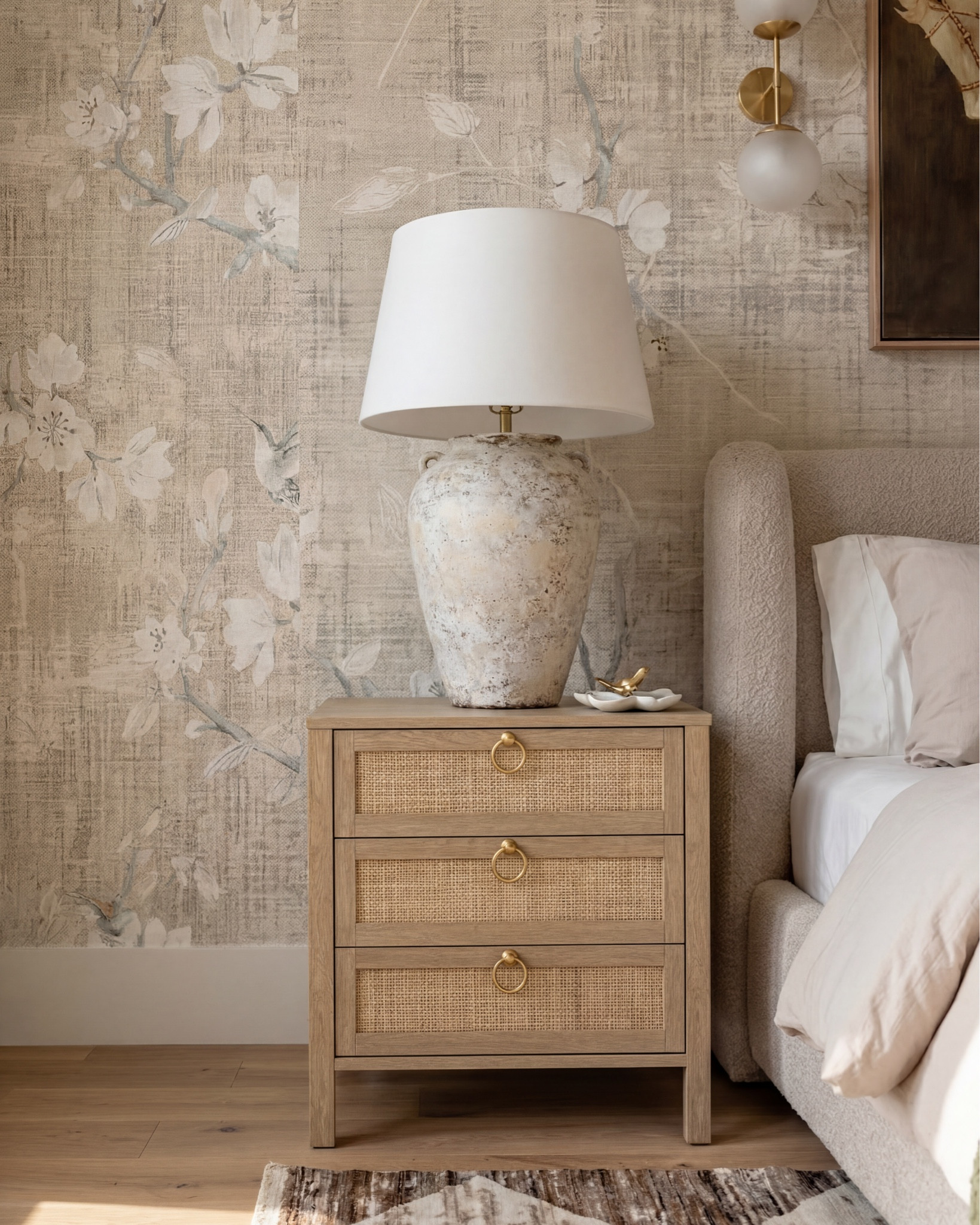 neutral upholstered bed frame curved footboard
boucle bed frame cream platform bed
beige upholstered bed modern soft frame
light wood nightstand with cane drawers
rattan nightstand 3 drawer natural wood
ceramic table lamp white textured base
modern white bedside lamp neutral shade
floral wallpaper neutral beige large scale print
vintage style floral wall mural soft neutral tones
brass wall sconces double globe modern
gold wall sconce round glass shade
framed horse artwork vintage equestrian wall art
neutral wall art set above bed warm tones
textured bench upholstered end of bed bench
boucle bench cream bedroom bench rounded edges
green throw blanket textured knit olive throw
neutral bedding set beige layered bedding
decorative throw pillows neutral green accent pillow
geometric area rug brown cream diamond pattern
modern neutral rug high pile bedroom rug
wood ceiling beams exposed rustic beams
brass chandelier modern minimalist curved arms
ceramic vase large neutral decor vase
faux floral arrangement yellow white flowers
wood dresser natural oak bedroom furniture
neutral bedroom decor warm minimalist aesthetic


#LTKHome #LTKSaleAlert