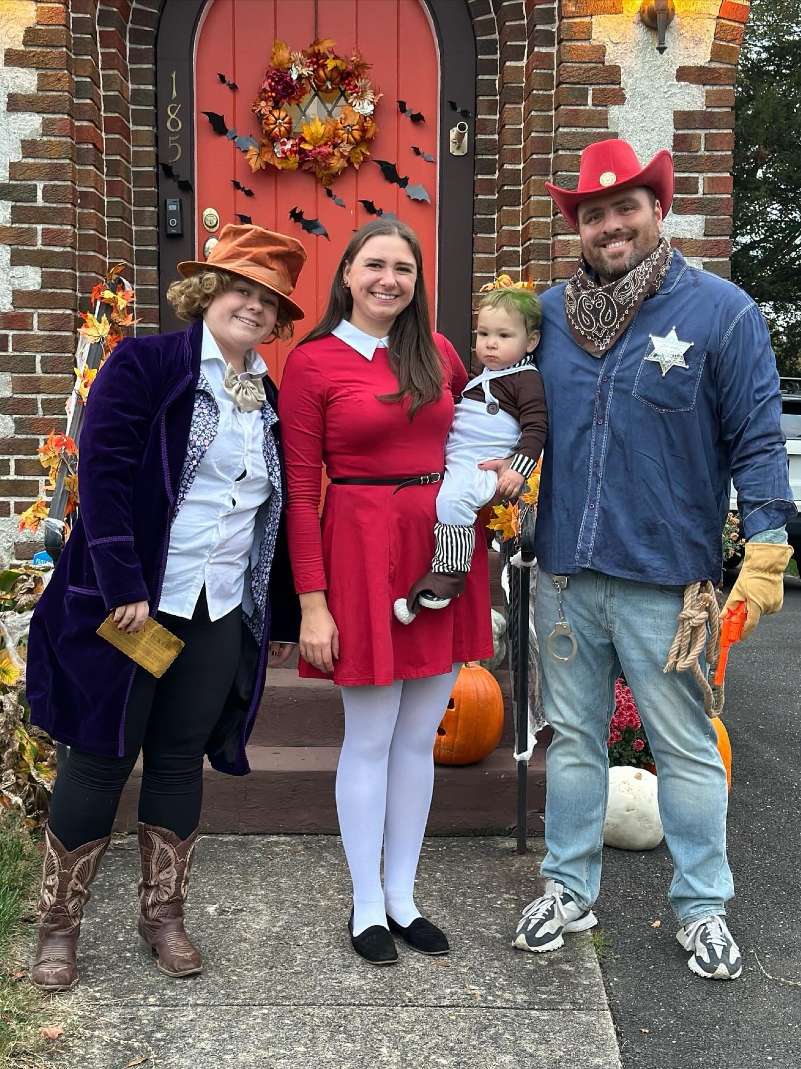 MaryAnn Signore and family are wearing a Halloween costume set to the theme of Willy Wonka. Characters include: Willy Wonka, Veruca Salt, Oompa Loompa, and Mike Teavee  

#LTKfamily #LTKbaby #LTKSeasonal