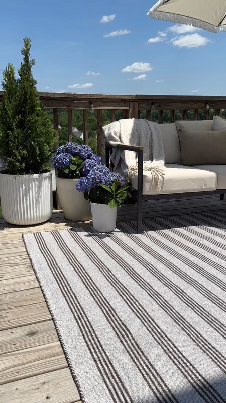 Repeat after me- you cannot go wrong with a good stripe 😍

Did a little rearranging and added the Charlie CHE-01 from @loloirugs to get our patio ready for Memorial Day ❤️💙 

This @joannagaines x Loloi indoor/outdoor area rug has a timeless design with a beautiful neutral brown stripe. Charlie is hand-loomed of 100% recycled polyester and so soft! Which is perfect for my son crawling around outside 🙌 

Easy-to-clean and durably made so it can hold up to high-traffic areas. To clean, hose off and air dry. 


#LTKSeasonal #LTKHome #LTKVideo
