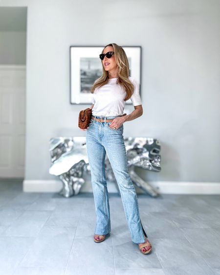 Name a more classic outfit combo than blue jeans and a white t-shirt! 

This fitted white t-shirt with gold buttons is on major sale! Also linked the blue boot cut jeans and woven tan bag which can be carried as a clutch or shoulder bag. #summeroutfits #capsulewardrobe #jcrew #classicstyle #bestjeans

#LTKStyleTip #LTKFindsUnder50 #LTKSaleAlert