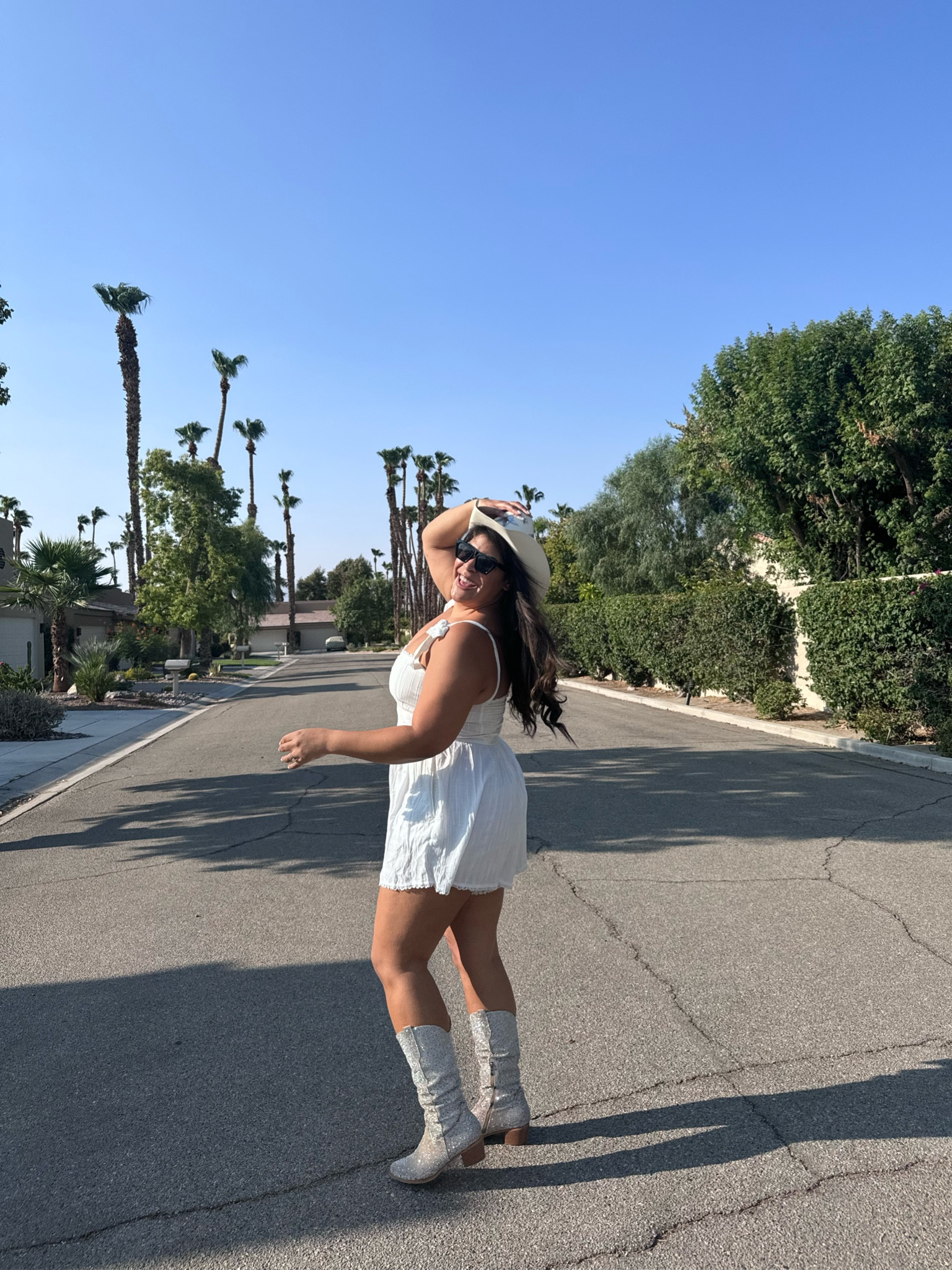 One of my favorite rompers from show me your mumu that is perfect for any bride or bachelorette party! I’m 5’9” 38D size 12/xl & I’m an XL! The sparkle rhinestone cowboy boots are from amazon & run tts ✨🫶🏽🌴💕

#LTKWedding #LTKSeasonal #LTKMidsize