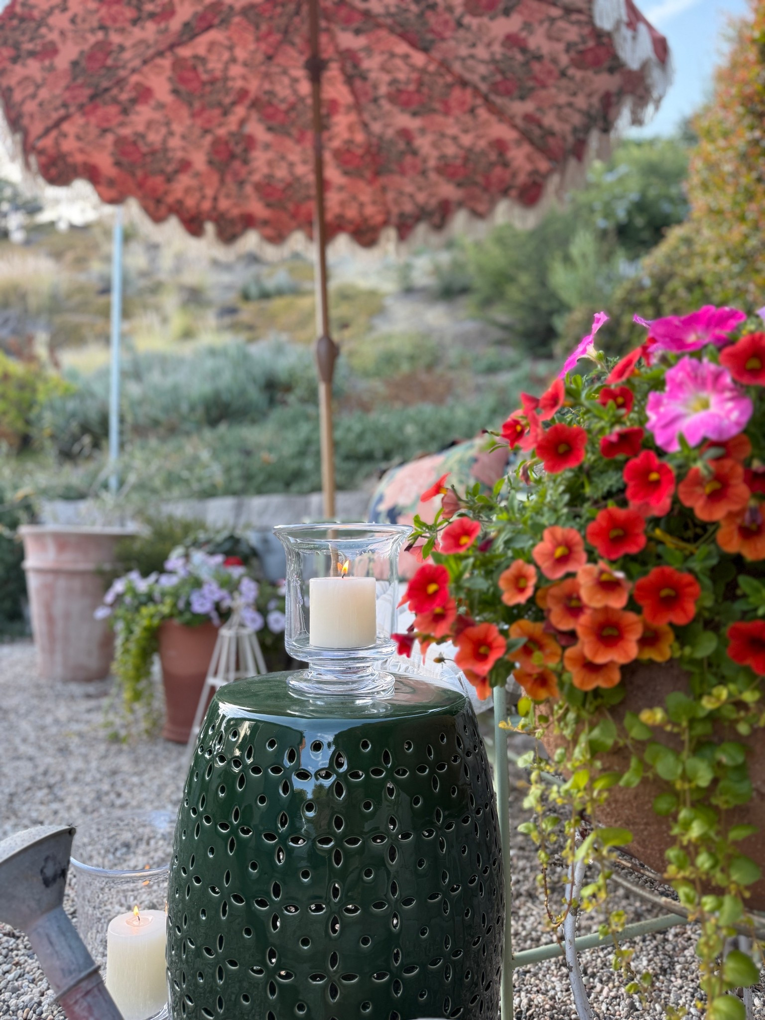 This side table provides the perfect pop of green in my garden. I love it paired with this revere hurricane candle holder. This hurricane comes with the candle included. ￼

#LTKSeasonal #LTKMothersDay #LTKdayinmylife