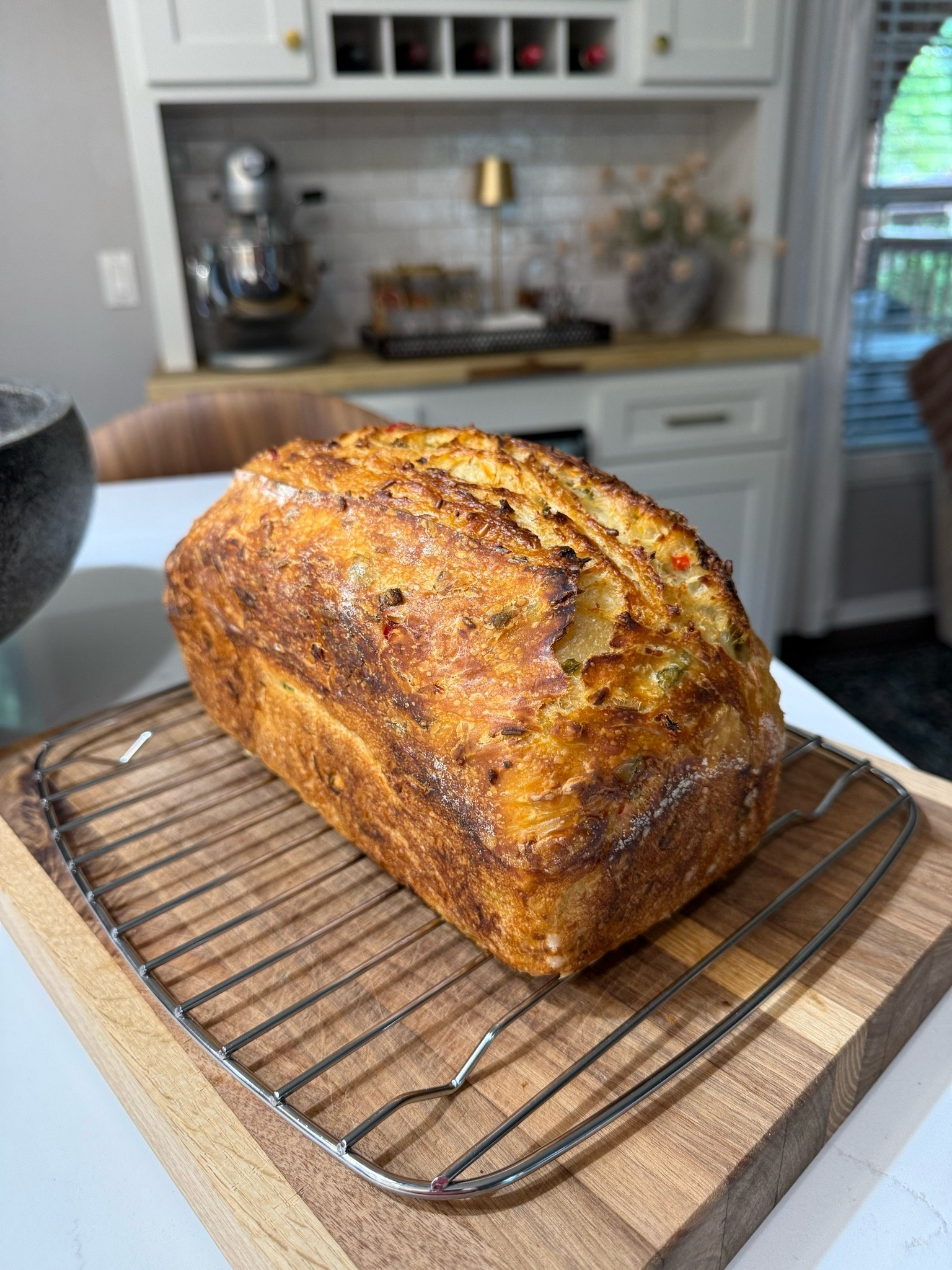 The best part of a morning is a fresh bake!

This is 70% hydration sourdough loaded with jalapeños, Fresno chilies, and pepper jack cheese!

#LTKvlog #LTKdayinmylife #LTKfoodie