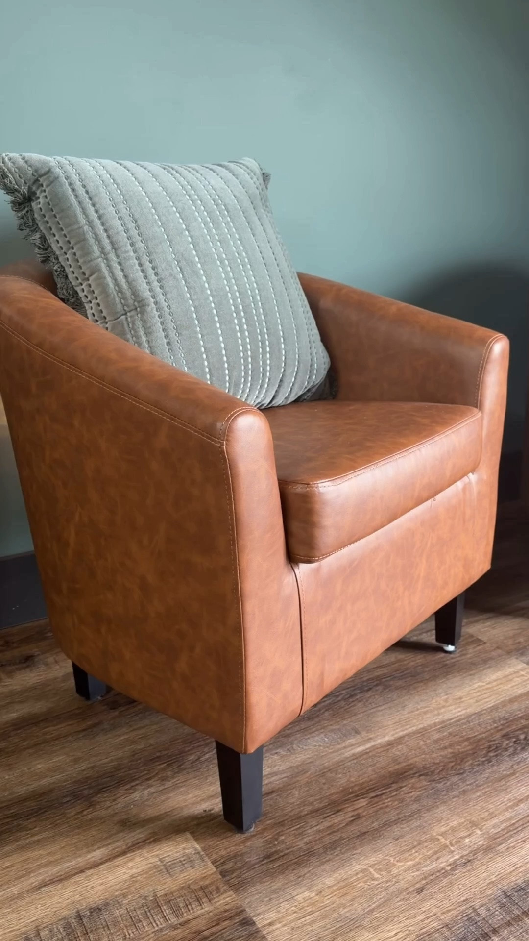 Obsessed is an understatement! 😍 

If you’ve been searching for the perfect affordable faux leather accent chairs to elevate your space, look no further. I am absolutely loving these cognac brown barrel chairs—they add the perfect touch of mid-century modern charm and warmth to any room.

Whether you’re styling a cozy living room reading nook, updating your home office seating, or looking for the ultimate apartment-friendly club chairs, these are a total game-changer. They feature a sleek, space-saving design, sturdy dark wood legs, and the faux leather is incredibly soft and easy to wipe clean (major bonus points!). BONUS - they come in a set and are very reasonably priced!

I paired mine with a textured sage green throw pillow for that moody, earth-toned vibe against the green walls, but they are so versatile they’d look amazing with any boho, modern, or transitional home decor.

They look way more expensive than they actually are, and the comfort level is 10/10.

#LTKhome #LTKstyletip #AccentChairs #LeatherChairs #LivingRoomInspo #HomeDecorFinds #CozyVibes #AmazonHome #WayfairFinds #TargetStyle #BudgetHomeDecor 

 #LTKHome #LTKSaleAlert