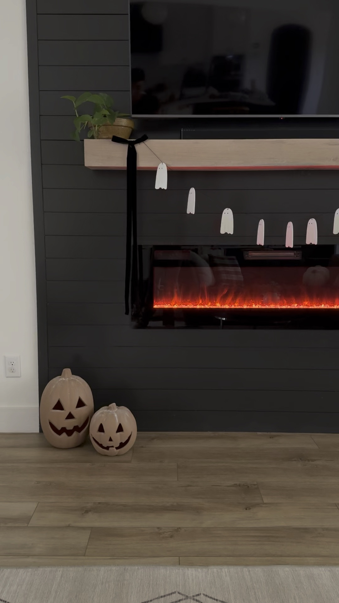 Fireplace 
Halloween mantle 
DIY pumpkins 
Happy jack o lanterns 
Ghost banner 
Halloween decor 
Spooky season 

#LTKSeasonal #LTKFindsUnder50 #LTKHome
