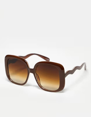 ASOS DESIGN oversized 70s sunglasses with wavy temple detail in crystal brown | ASOS (Global)
