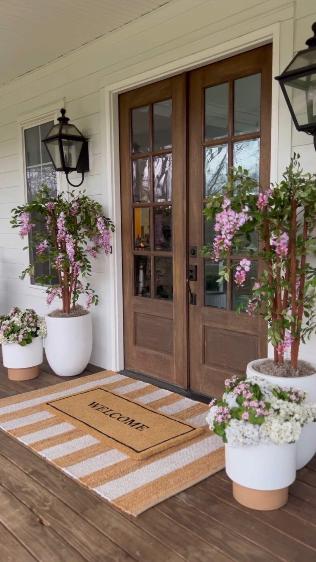 More spring porch inspo with all the color!

So excited to share this spring porch from two years ago because I just LOVED the pop of color these trees added!🌸I kept everything else very simple so they could really be the star of the show!

Here are the steps I use to get my porch ready for the season:

1. Layer a neutral scatter or jute rug and welcome mat! Note: I only recommend the one shown in this video if you have a covered porch. It does not hold up well when exposed to weather. I have several other great options linked over in other posts in my LTK!

2. Add baskets or planters of varying textures and fill with greenery or trees...don’t be afraid to go faux! 

3. Top it off with spring wreaths - this time I left off the wreaths so the trees could have their moment!

#LTKSaleAlert #LTKHome #LTKSeasonal