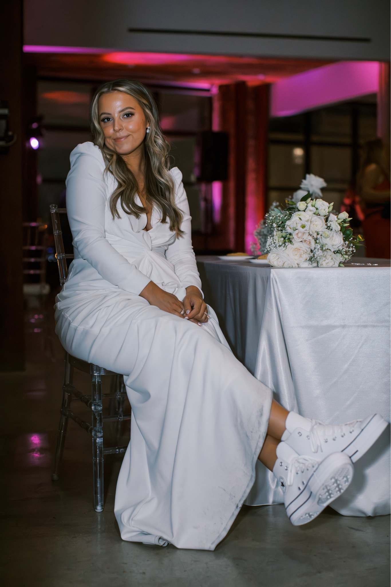 Switched into these high top leather converses for dancing! Bridal shoes. Wedding shoes. White sneakers.

#LTKshoecrush #LTKfindsunder100 #LTKwedding