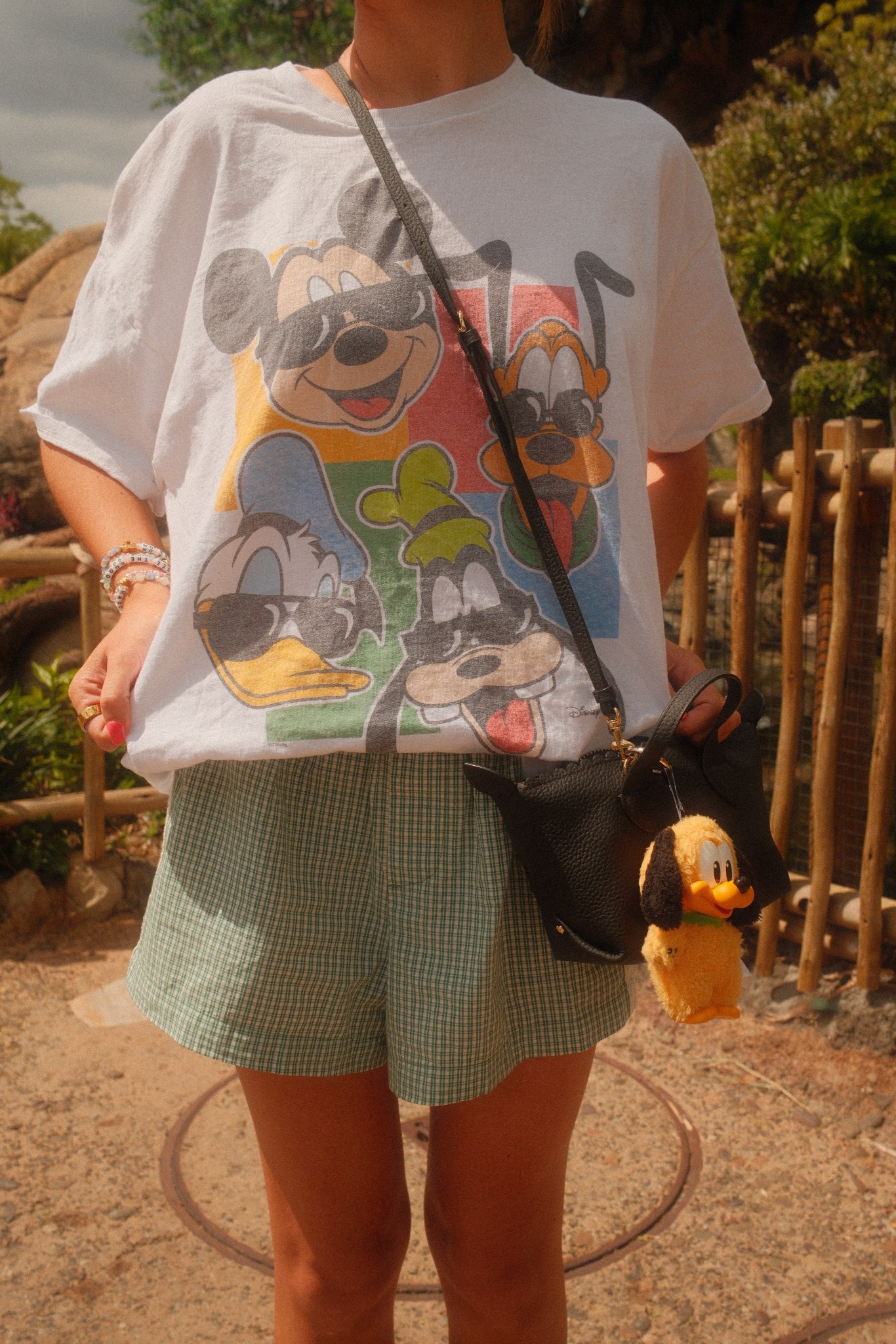Comfy Disney ootd💚 shirt is from junkfood clothing!!! Disney outfit, Disney ideas, Disney Inspo, Disney parks, Disney style, Disney girl, Disney aesthetic, old navy gingham eyelet shorts, boxer shorts trend, Disney graphic tee, leather Stoney clover lane pouchette crossbody Disney bag, Disney accessories #disneh

#LTKTravel #LTKFestival #LTKootd