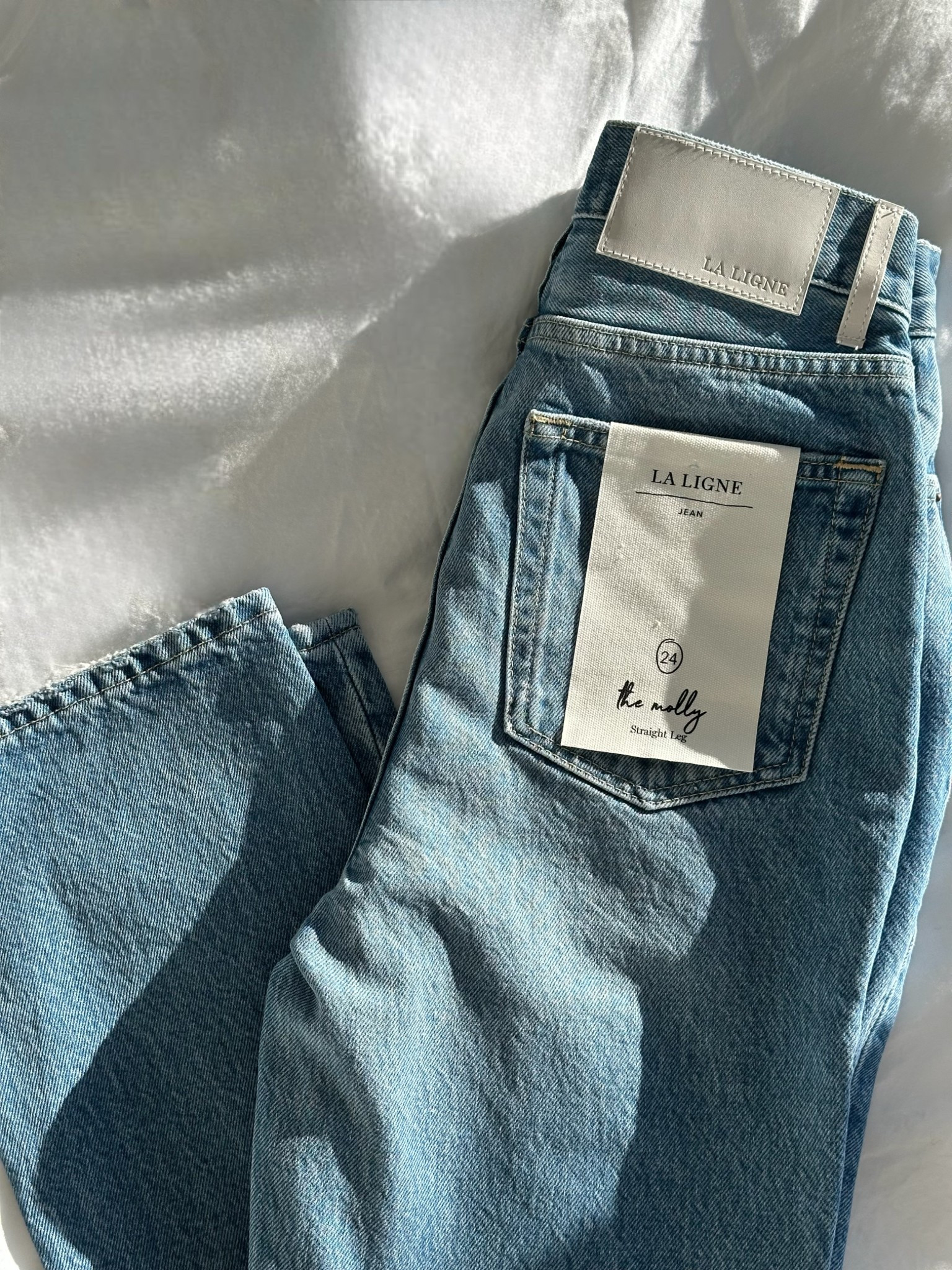 The perfect straight-leg jeans do exist. Meet the Molly High-Rise Straight Jeans from @lalignenyc—designed with just the right amount of structure and stretch for an effortless, tailored look. The wash? A perfect, wear-with-anything blue. #ad