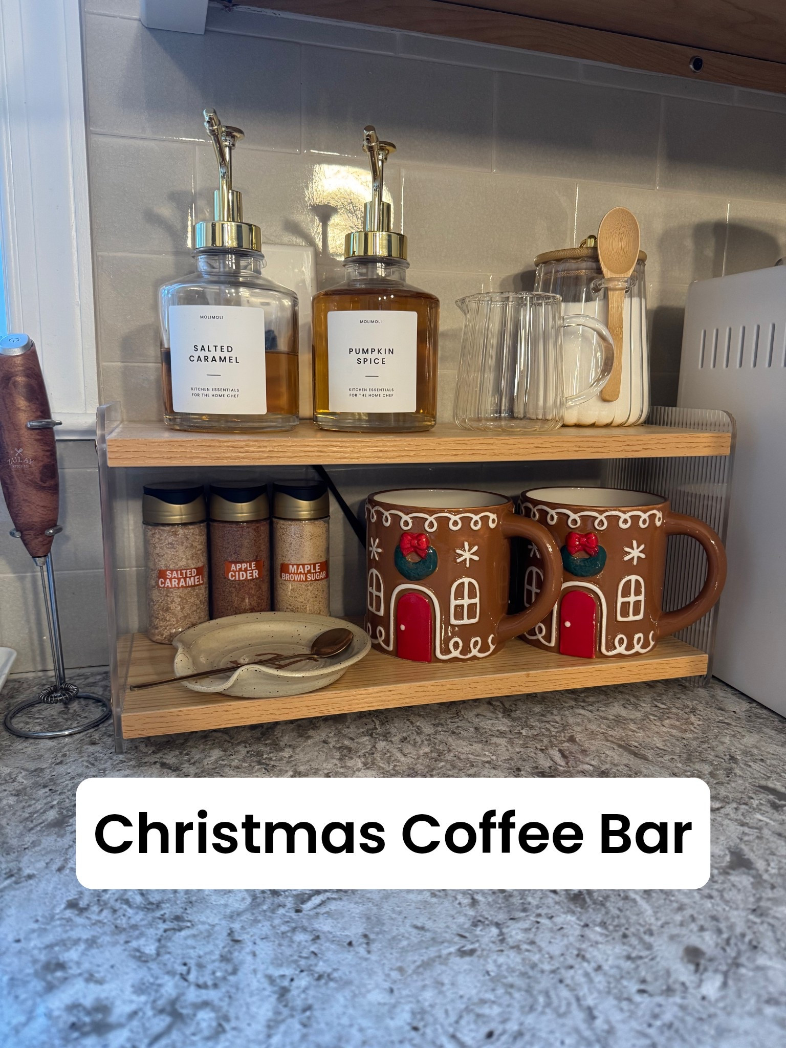 How cute is this Christmas coffee bar?! I just found these mugs at Target. Swapping out the pumpkin spice syrup for vanilla when it comes in 🫶🏼

Coffee bar, Christmas coffee bar, gingerbread mug, gingerbread theme, coffee corner, Christmas decor, kitchen decorations, kitchen counter setup, kitchen counters, kitchen counter decor, kitchen counter shelves, aesthetic coffee bar, sugar container, milk frother, coffee syrup pump, coffee syrup dispenser, aesthetic coffee corner  

#LTKHoliday #LTKGiftGuide #LTKHome