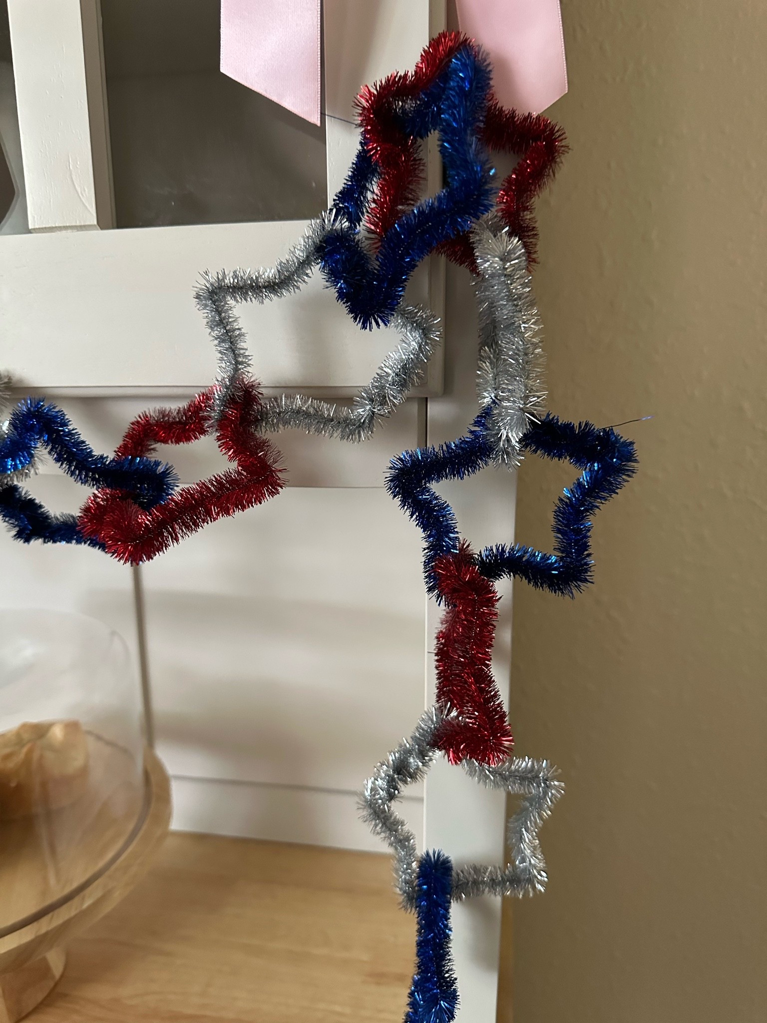This pipe cleaner garland was so easy and fun to make for the upcoming Memorial Day weekend and 4th of July. Grab it all here.

#LTKSeasonal #LTKHome #LTKmomlife