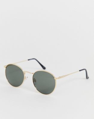 ASOS DESIGN round sunglasses in gold metal with smoke lens | ASOS (Global)