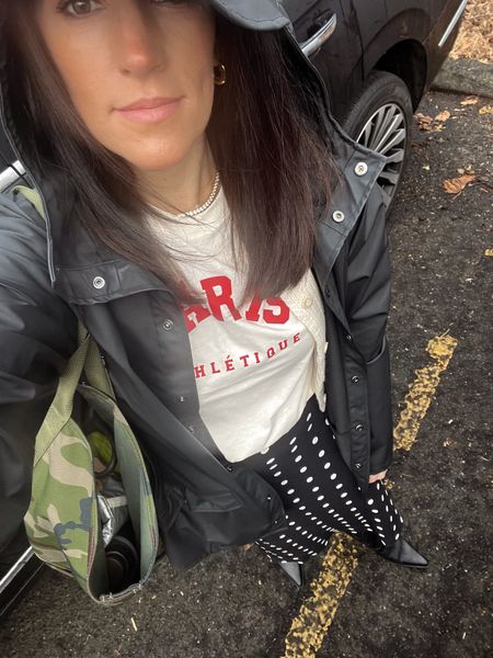 Rainy day work fit
Love a graphic tee with a slip skirt, easy and comfortable. Wearing a S in the shirt.
This rain jacket is my go-to (wearing a M)

#LTKstyletip #LTKworkwear #LTKSeasonal