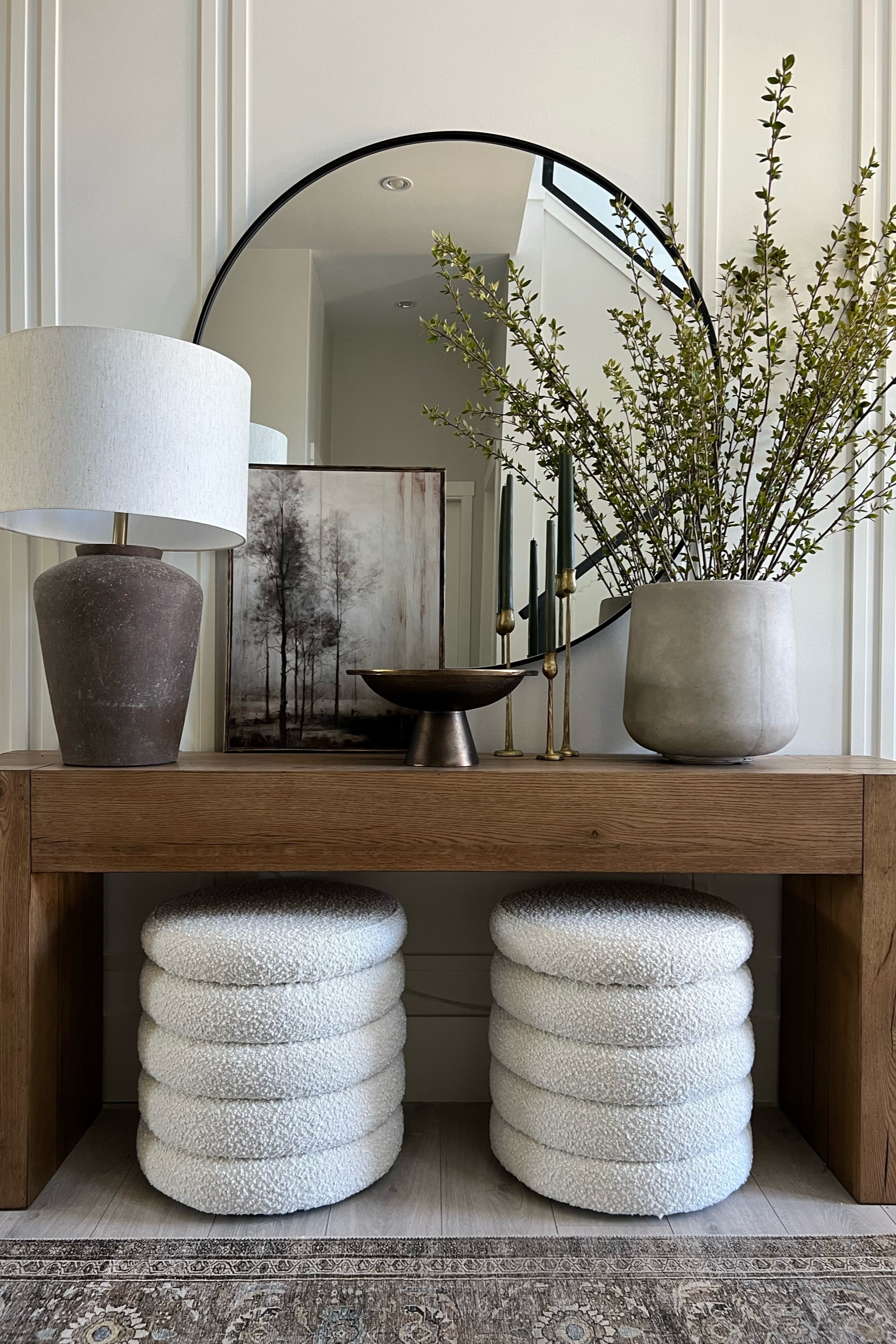 A few large scale pieces making a statement here! A chunky wood 72” console table can take the weight of a few oversized pieces: mirror, lamp, concrete planter 
Modern organic home decor 

#LTKhome