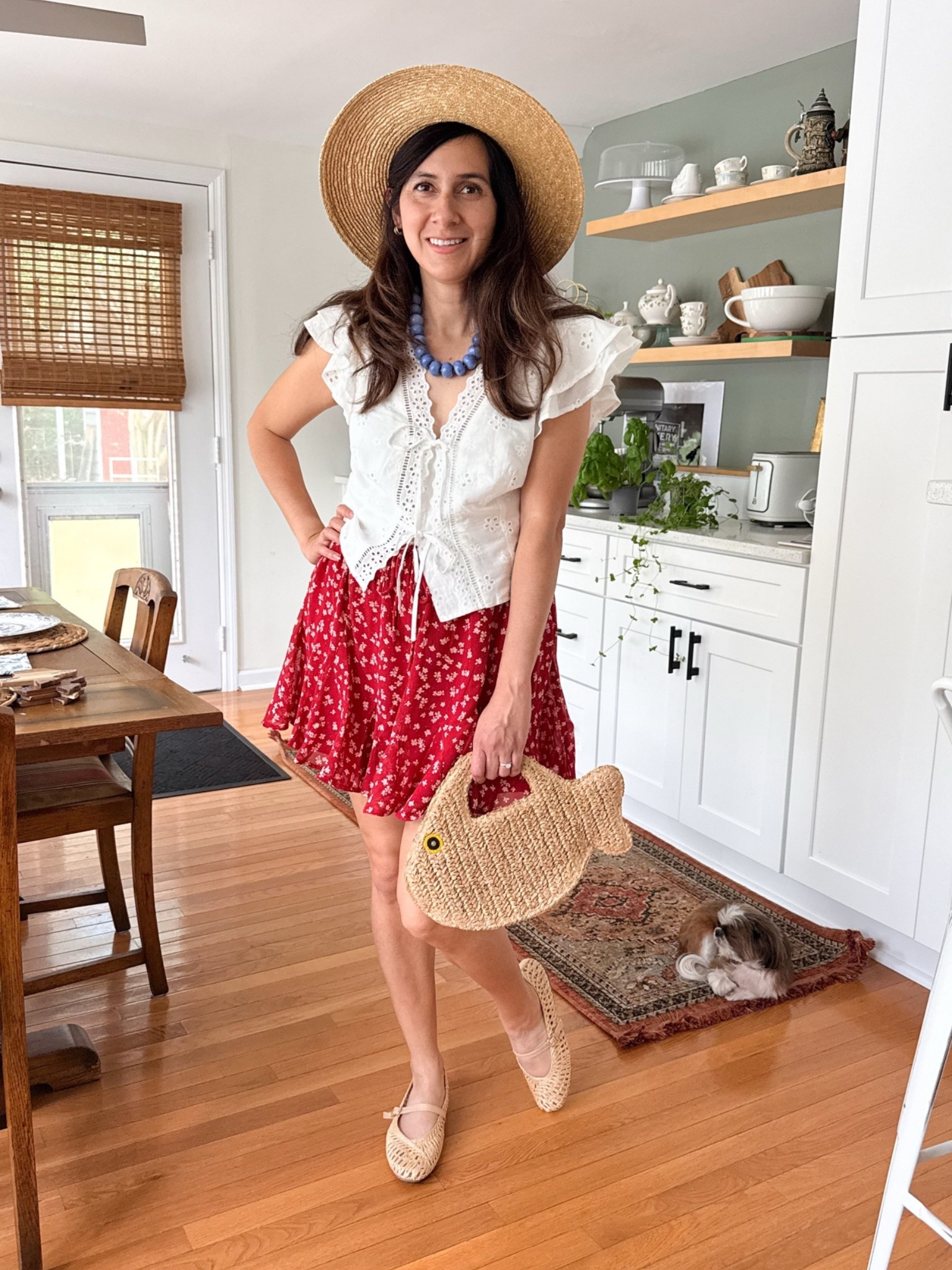 Looking for cute summer outfit ideas that feel feminine, and effortless? This red floral mini skirt outfit is giving coastal summer vacation during the Red White and Blue season.  

The white eyelet ruffle top paired with the flowy red floral skirt feels light, romantic, and easy to wear for everyday summer plans. I styled it with woven Mary Jane flats, a straw hat, and the cutest fish-shaped raffia bag for a playful coastal-inspired touch 

Save this for your next summer outfit idea

#LTKootd #LTKOver40 #LTKSeasonal