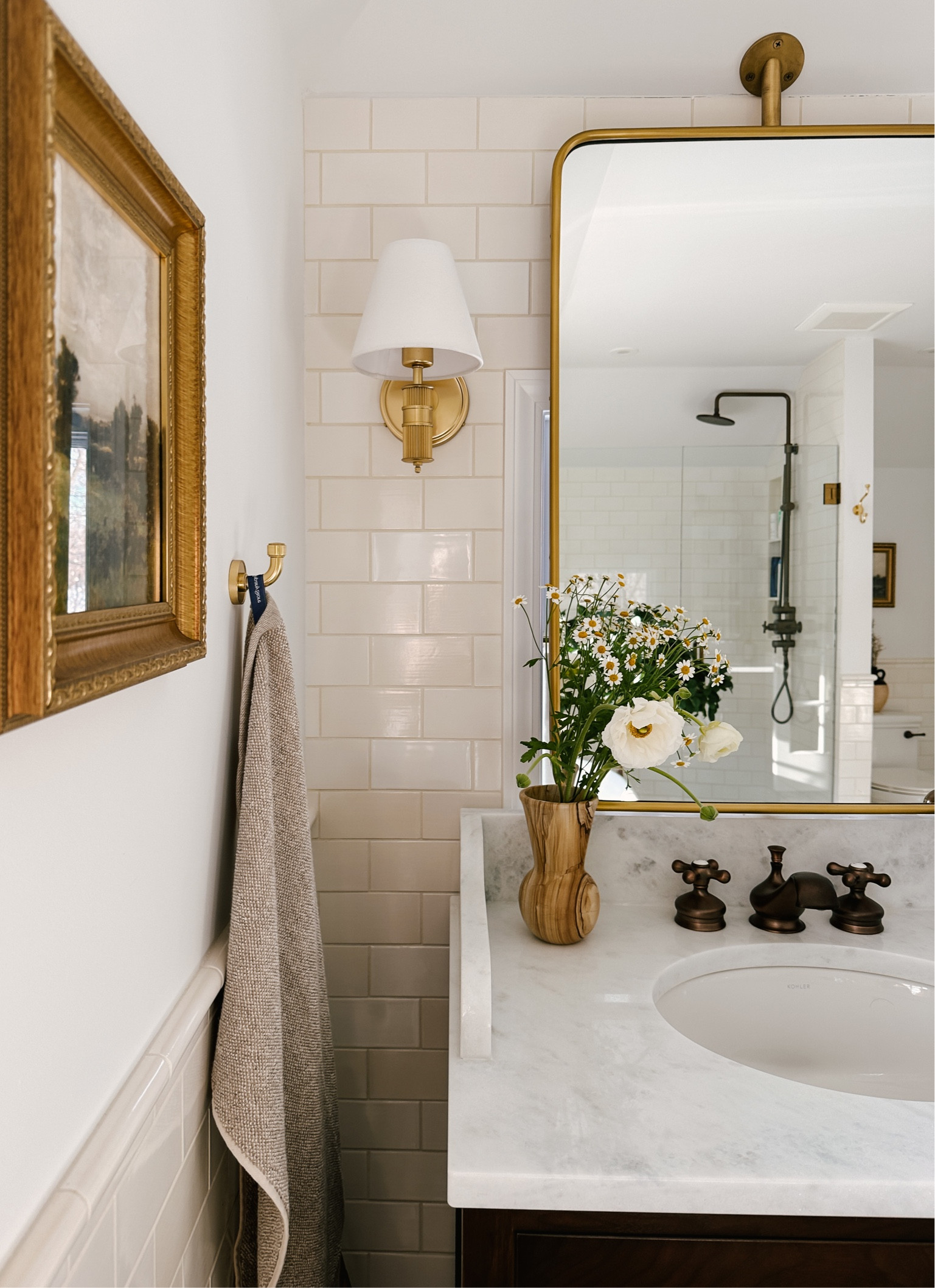 Our Rejuvenation bathroom sconces are 20% off + free shipping! It hardly goes on sale. *framed artwork, mirror, hook, towel 