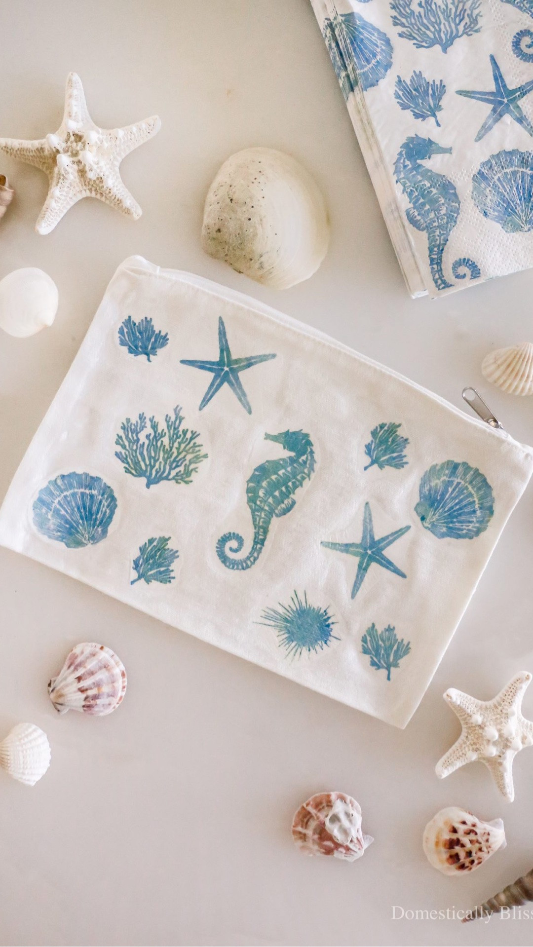 One of my favorite craft supplies is paper napkins.
I have a whole collection of napkins for crafting, and I love finding new ways to use them, from candles to kitchen towels, and even this makeup bag!
Isn’t this DIY Beach Napkin Makeup Bag absolutely perfect for summer or a beach trip!?
Cleaning Note: I highly recommend spot cleaning and, if need be, very gently hand washing. 

See details: https://domesticallyblissful.com/diy-beach-napkin-makeup-bag/

#LTKSummerCrafts #LTKBeachCrafts #LTKcrafts #LTKMakeupBag

#LTKTravel #LTKBeauty
