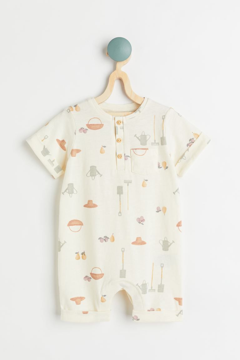 Conscious choice  New ArrivalBaby Exclusive. Romper in soft organic cotton slub jersey with a but... | H&M (US)