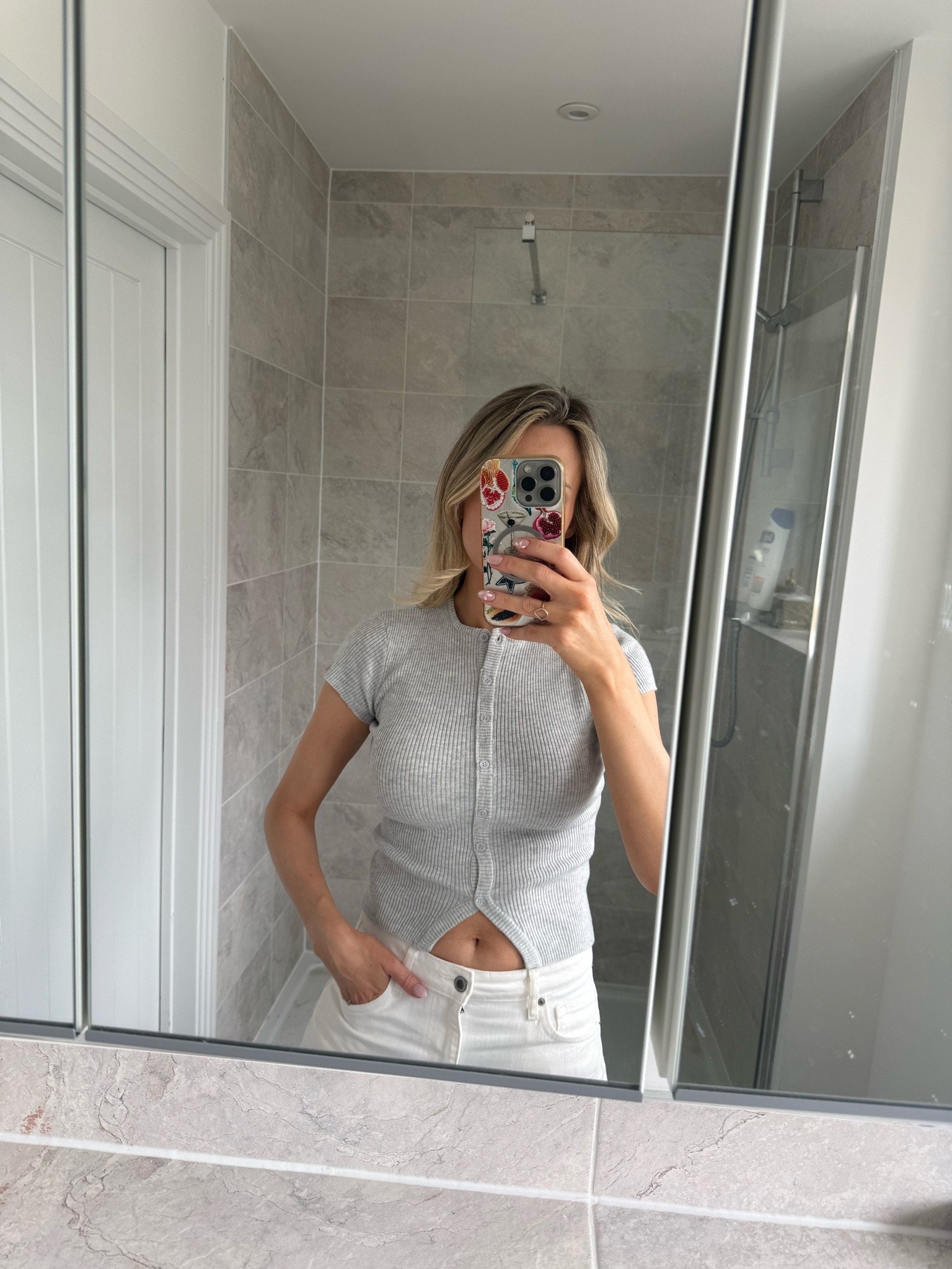 Grey ribbed knit top , white barrel jeans and black toe thong sandals

#LTKsummer #LTKuk