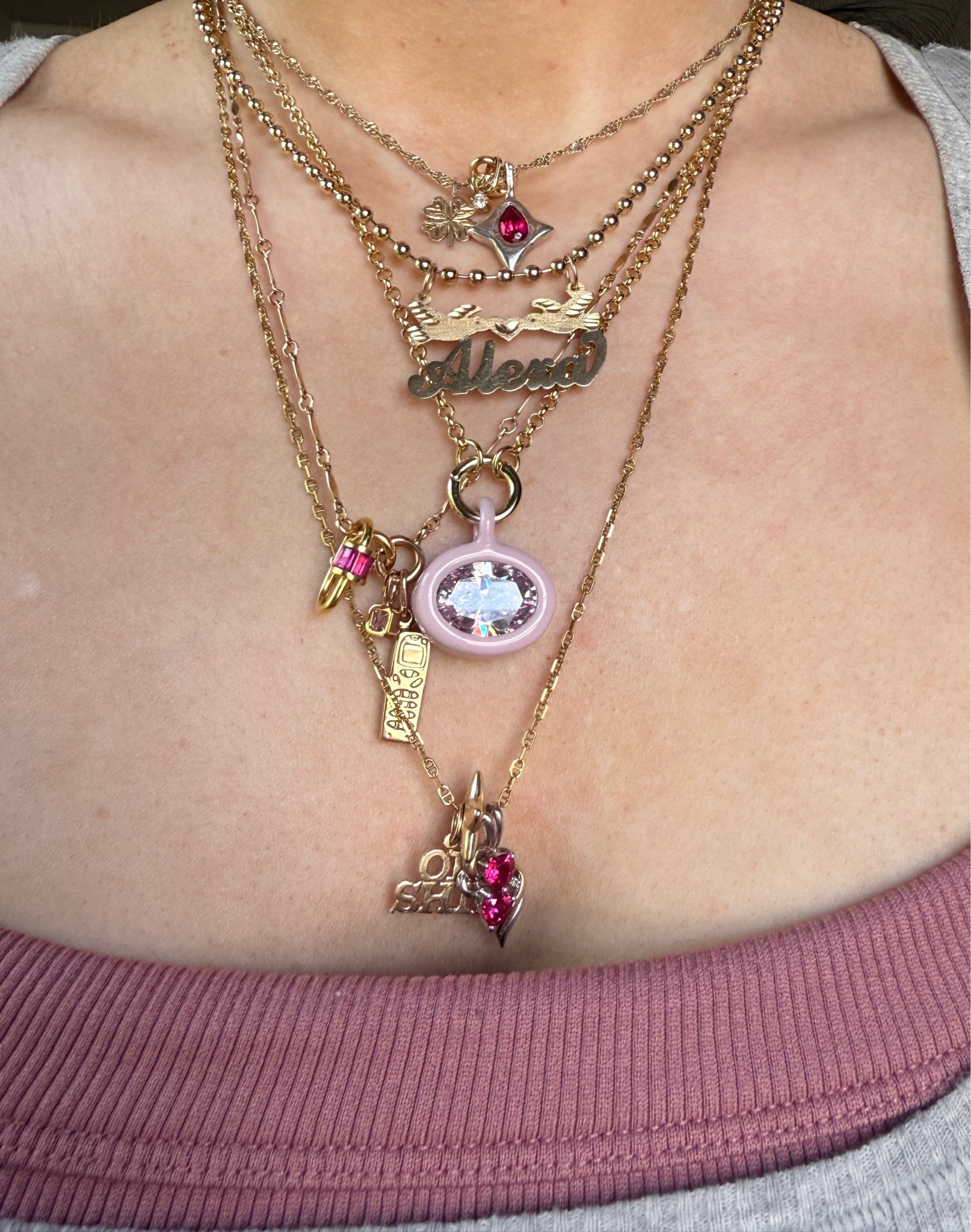 Lil pink & ruby moment for today 💖🌺🫶🏻

14k gold nameplate and “oh shit” charm are from Yeah it’s Jewelry. Lariat from Brave Daughters Jewelry. Nokia phone charm from Danjmnt on instagram. Sterling silver ruby sparkle charm from River_wilder on instagram. 

#affordablejewelry
#finejewelry
#14kgoldnecklace
#jewelryinspo #necklaces #necklaceinspo
#necklacestack #jewelrystack #etsyjewelry #amazonjewelry
#LTKFindsUnder50
#LTKFindsUnder100
#LTKGiftGuide