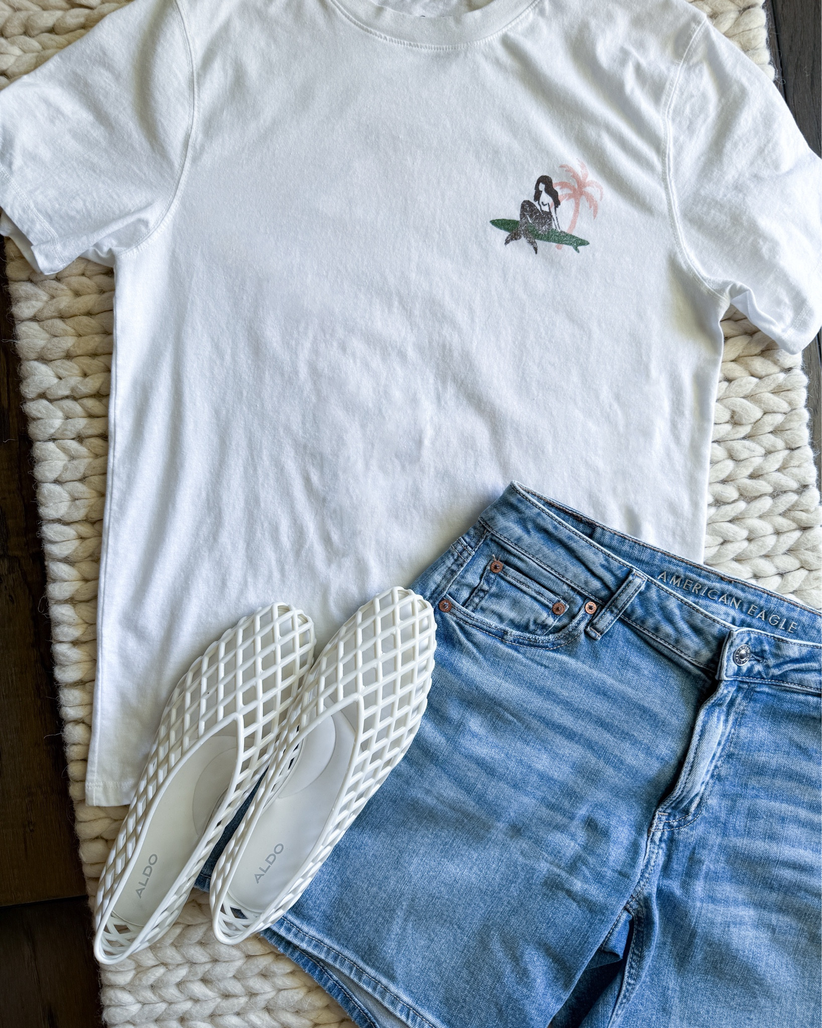 Obsessed with this Mermaid Coast Surf Club tee (don’t sleep on the Target men’s section for cute oversized graphic tees — I grabbed this one in size small for the perfect oversized fit) paired with American Eagle denim shorts (size 0) and ALDO white jelly flats (size down 1 whole size) for the ultimate coastal summer vibe. Linked it all on my LTK. 

First shared on May 31 #and321

Target men’s graphic tee - oversized summer tee - Mermaid Coast tee - surf club graphic tee - American Eagle denim shorts - size 0 denim shorts - ALDO white jelly flats - cute summer outfit - coastal casual look - beach day outfit - laid-back summer fashion - trendy summer style - LTK summer outfit picks

#LTKU #LTKStyleTip #LTKSummerEdit