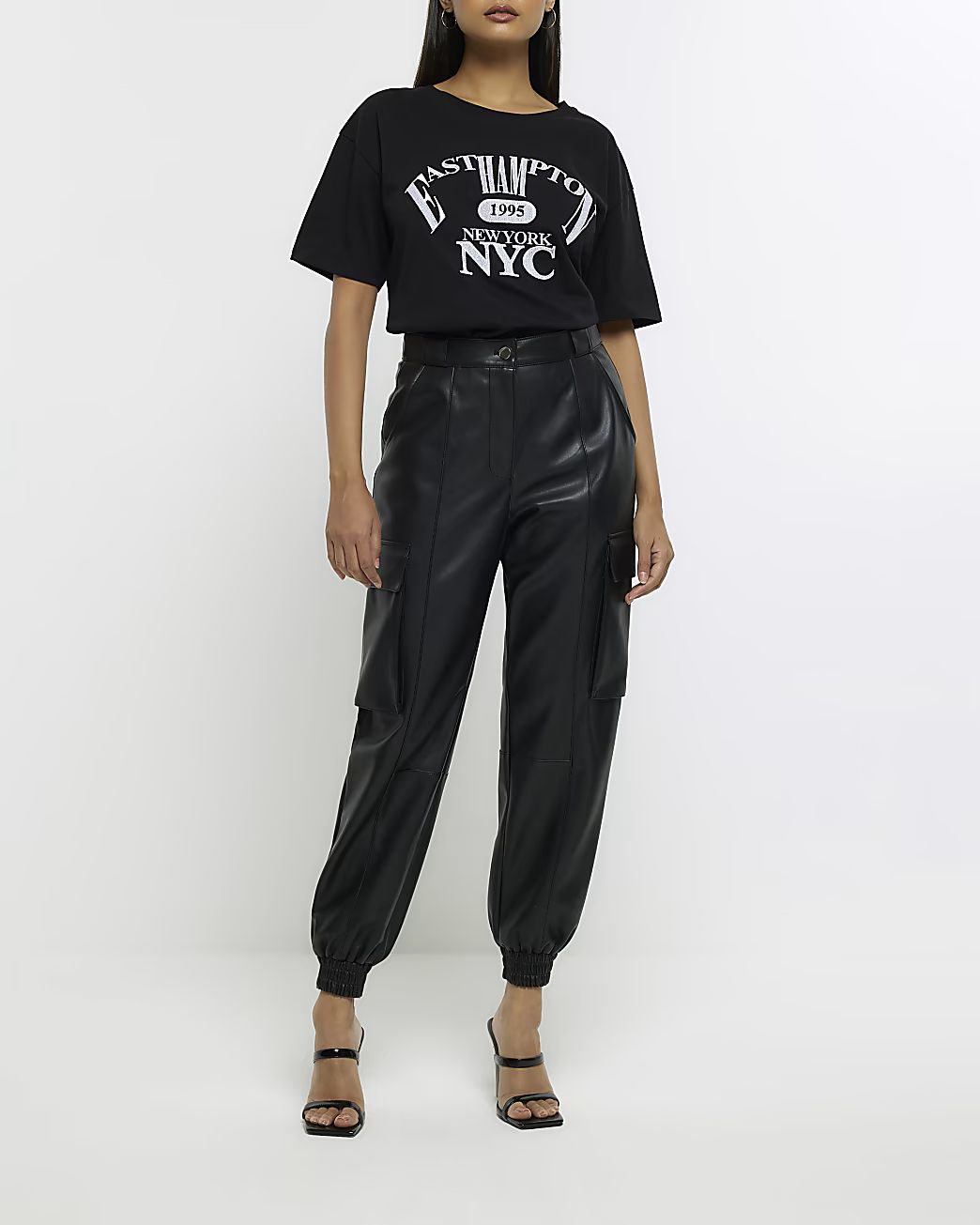 Black faux leather utility cargo trousers | River Island (UK & IE)