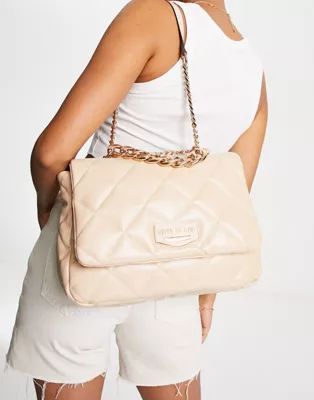 River Island faux leather quilted chain shoulder bag in beige | ASOS (Global)