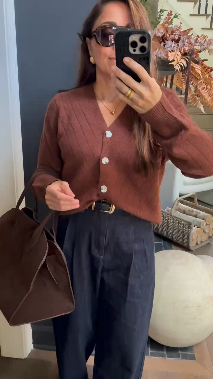 BARREL JEANS are having a MOMENT and I completely understand why!!!  I love the shape they give an outfit, especially paired with a cardigan and a great belt. It feels relaxed but still SO put together. Add an oversized chocolate brown bag and suddenly we have the perfect fall uniform!!! And YES, these are Amazon finds! XxV

#LTKootd #LTKOver40 #LTKPetite