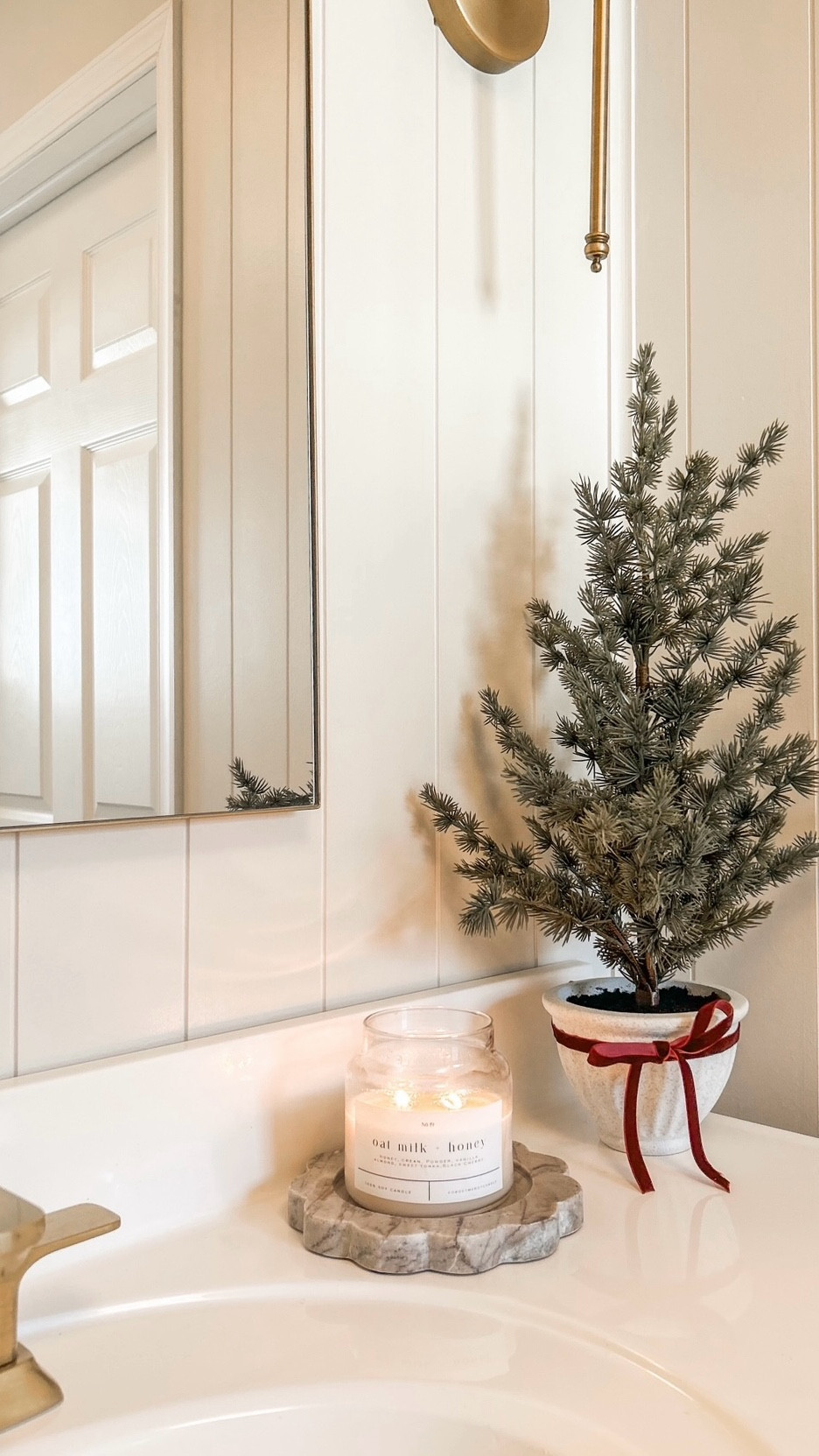 The simplest way to take your bathroom decor from Winter to festive for the holiday, add a red velvet bow! 🎀♥️ 

Bathroom inspo, neutral paint inspo, holiday home inspiration  

#LTKFindsUnder50 #LTKHome #LTKHoliday