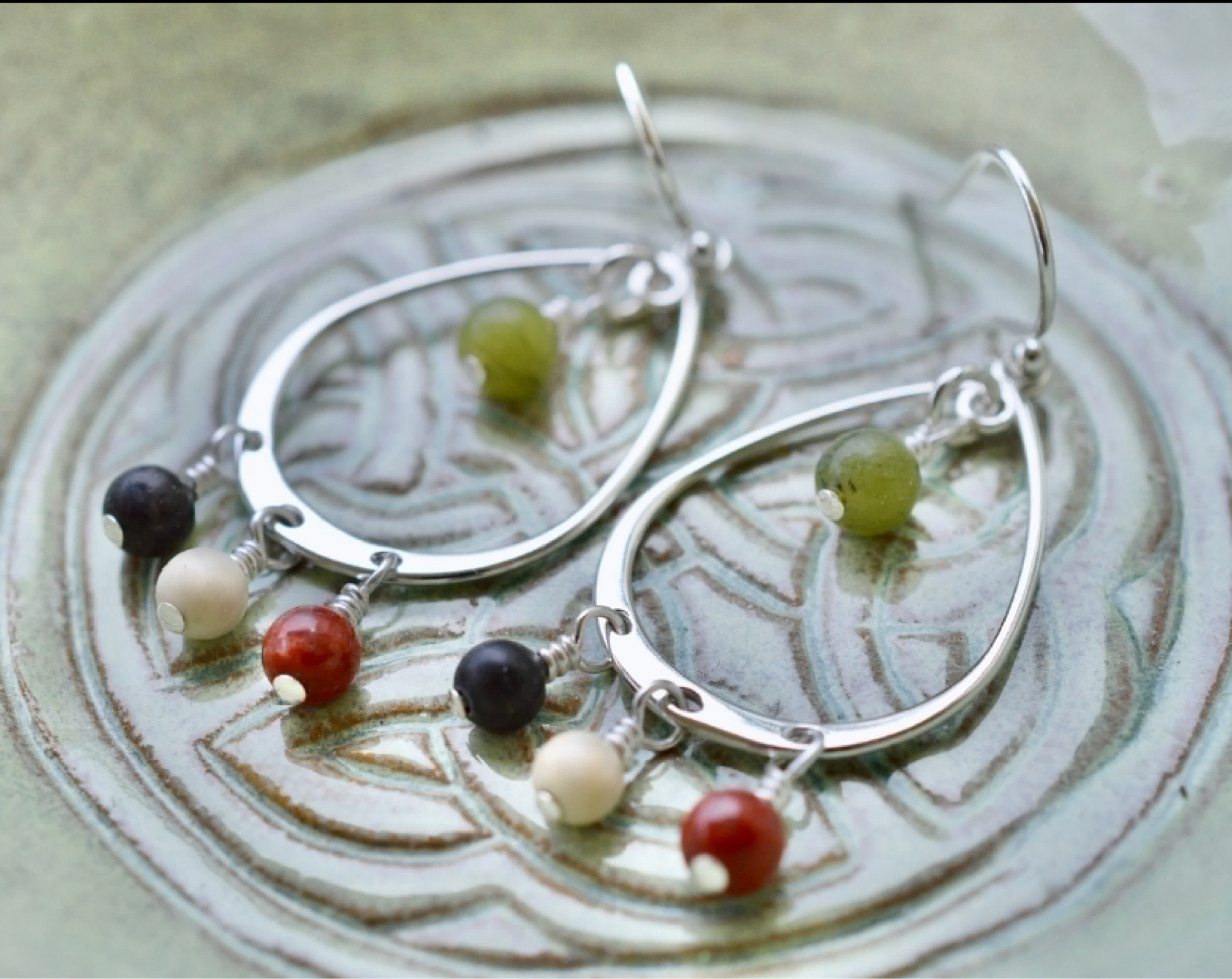 Four Provinces of Ireland Irish Marble Sterling Silver Earrings☘️ 

These sterling silver chandelier earrings contain so much of Ireland in their design it's hard to know where to start. They contain each of the four beautiful marbles that come only from the Emerald Isle: the Green Connemara marble (considered the national gemstone of Ireland), the red Cork marble, the Black Kilkenny marble, and the white Ulster marble. The map (on the Etsy Shop linked below) shows you the outlines of the four different provinces and whether your ancestry or interest is in Ulster (Ulaidh), Connemara ( Connachta), Munster (Mumhan), or Leinster (Leighean), you will be wearing a piece of Ireland from your ancestral region. 

These four marbles are used in many architectural designs around Ireland as well and they are stunning as columns in cathedrals as well as on jewelry. They are natural stones and so each bead is unique. Each earring is solid sterling silver and sterling silver ear wires.

#LTKTravel #LTKStyleTip #LTKU