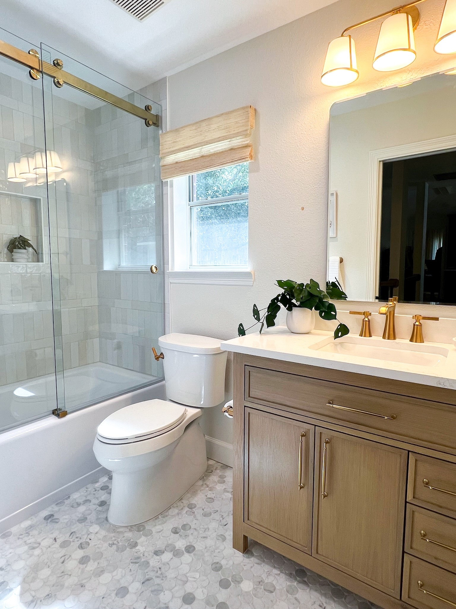 A serene #bathroomtransformation. 👌🏻 #WoodlandsStyleHouse
Construction: Evermon Homes 

#LTKHome #LTKStyleTip
