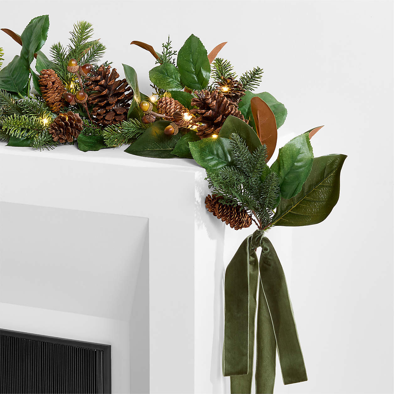 Faux Magnolia and Pinecone Pre-Lit Holiday Garland 6' + Reviews | Crate & Barrel | Crate & Barrel