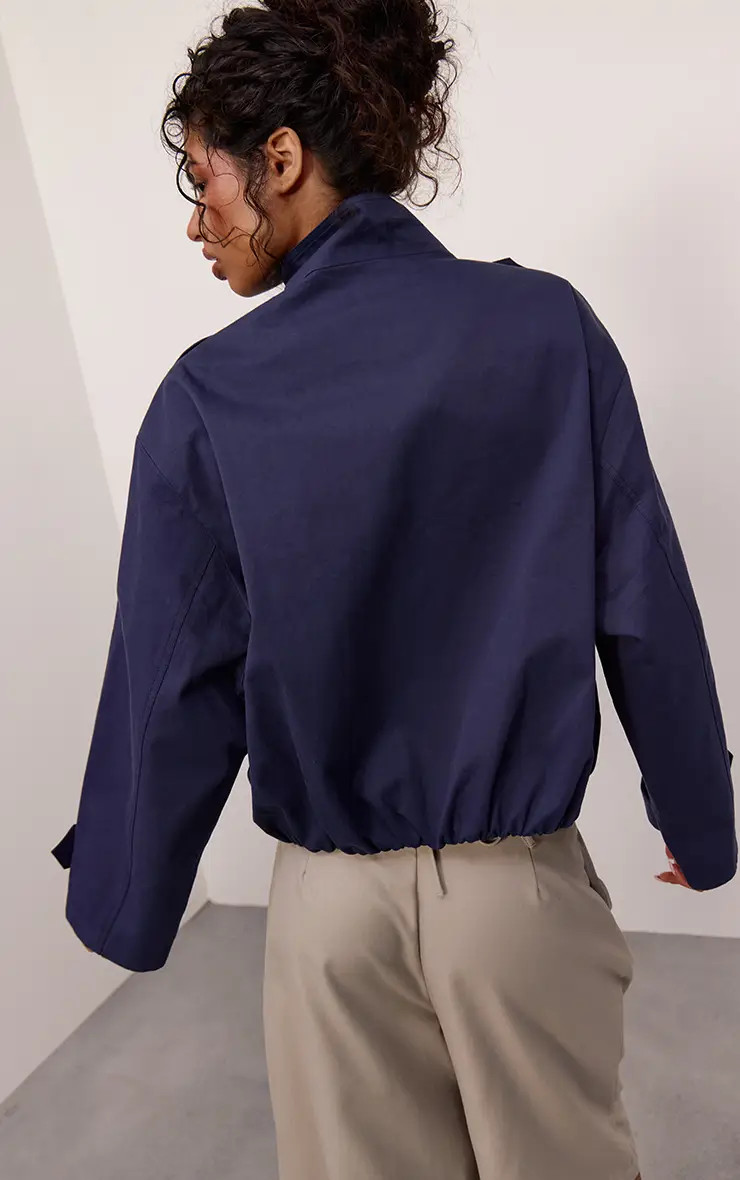 Navy Funnel Neck Balloon Hem Cropped Trench | PrettyLittleThing US