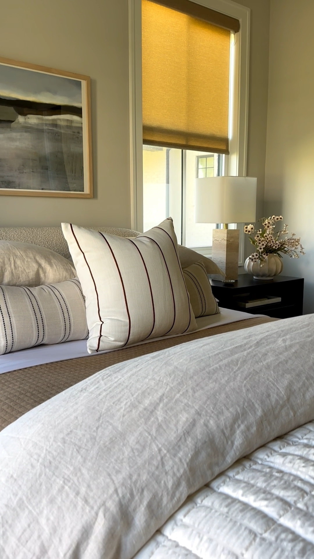 Transitioning warm gray walls into warm neutrals with great textiles. Bedding, rug, and blinds in warm tones


#LTKSaleAlert #LTKHome #LTKdayinmylife