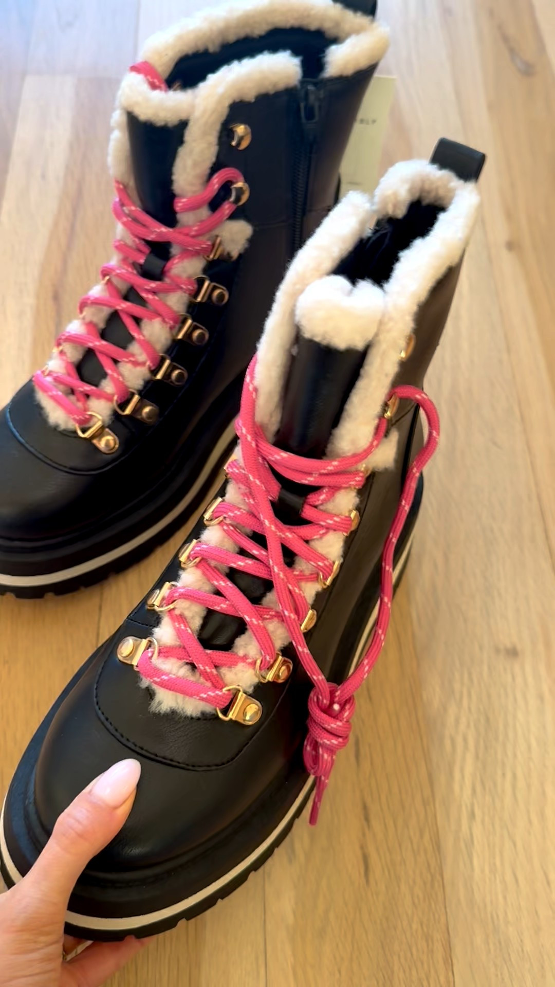 Black hoots with shearling and pink laces on sale and going fast! 

#LTKSaleAlert #LTKFindsUnder50